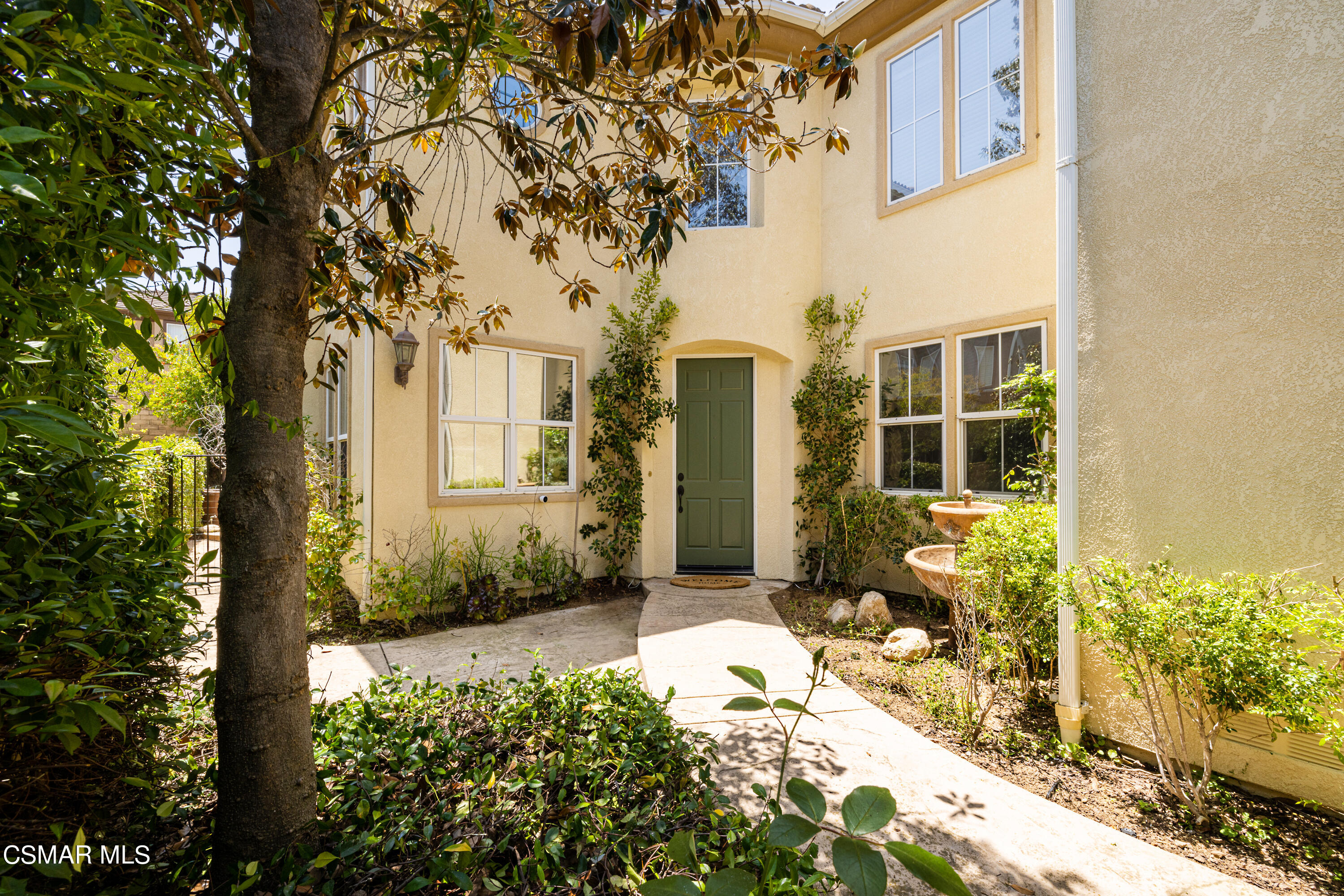 110 Park Hill Road Simi Valley, CA 93065 - Photo 5 of 36 a front view of a house with a yard