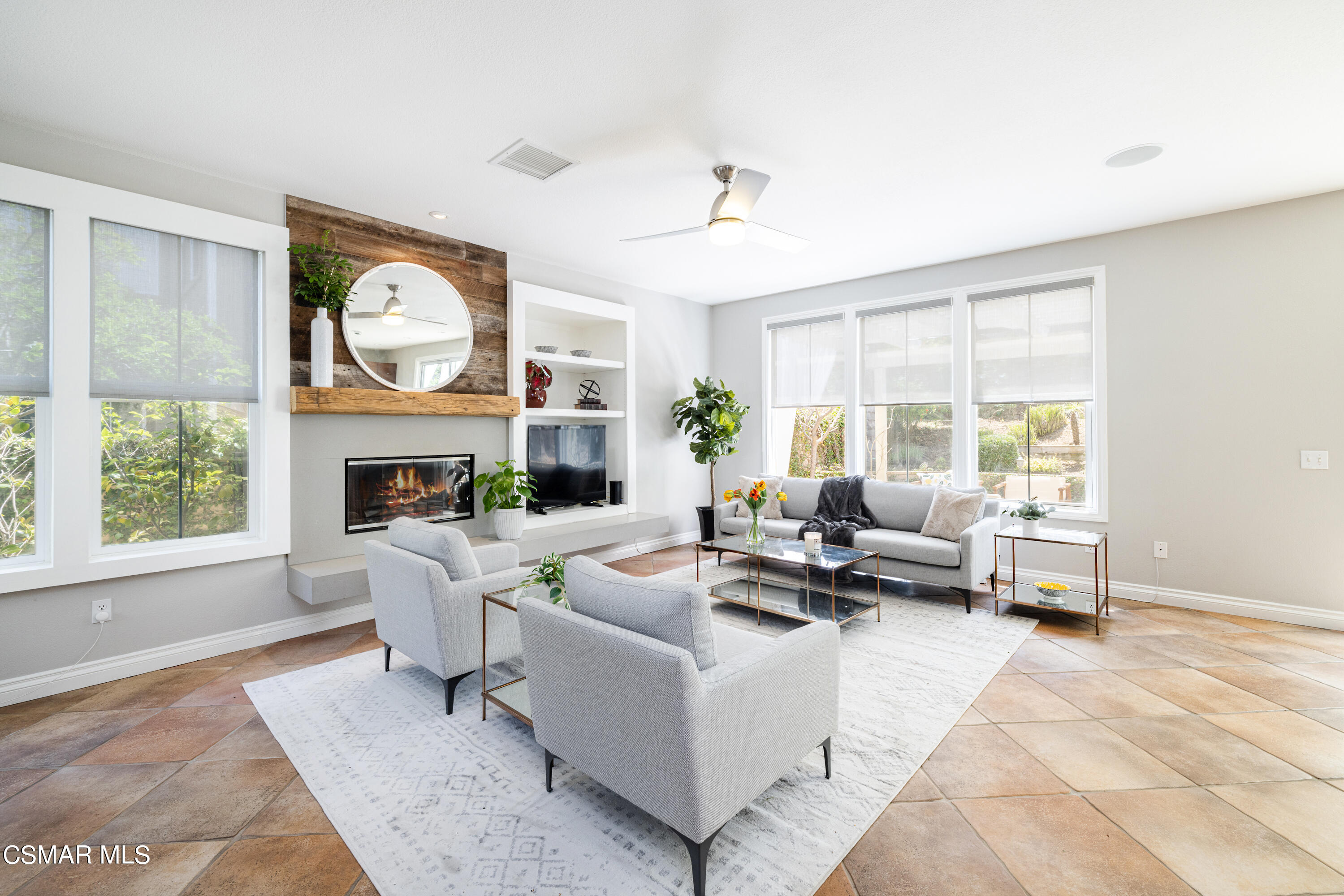 110 Park Hill Road Simi Valley, CA 93065 - Photo 7 of 36 a living room with furniture a fireplace and a large window