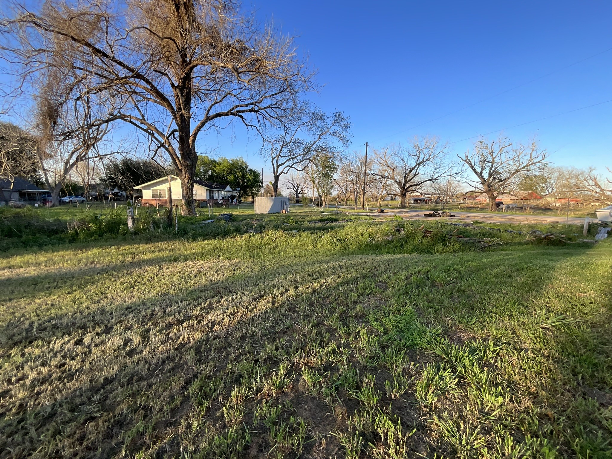 803 North Spanish Camp Road Wharton, TX 77488 - Photo 13 of 13 a view of a backyard of the house