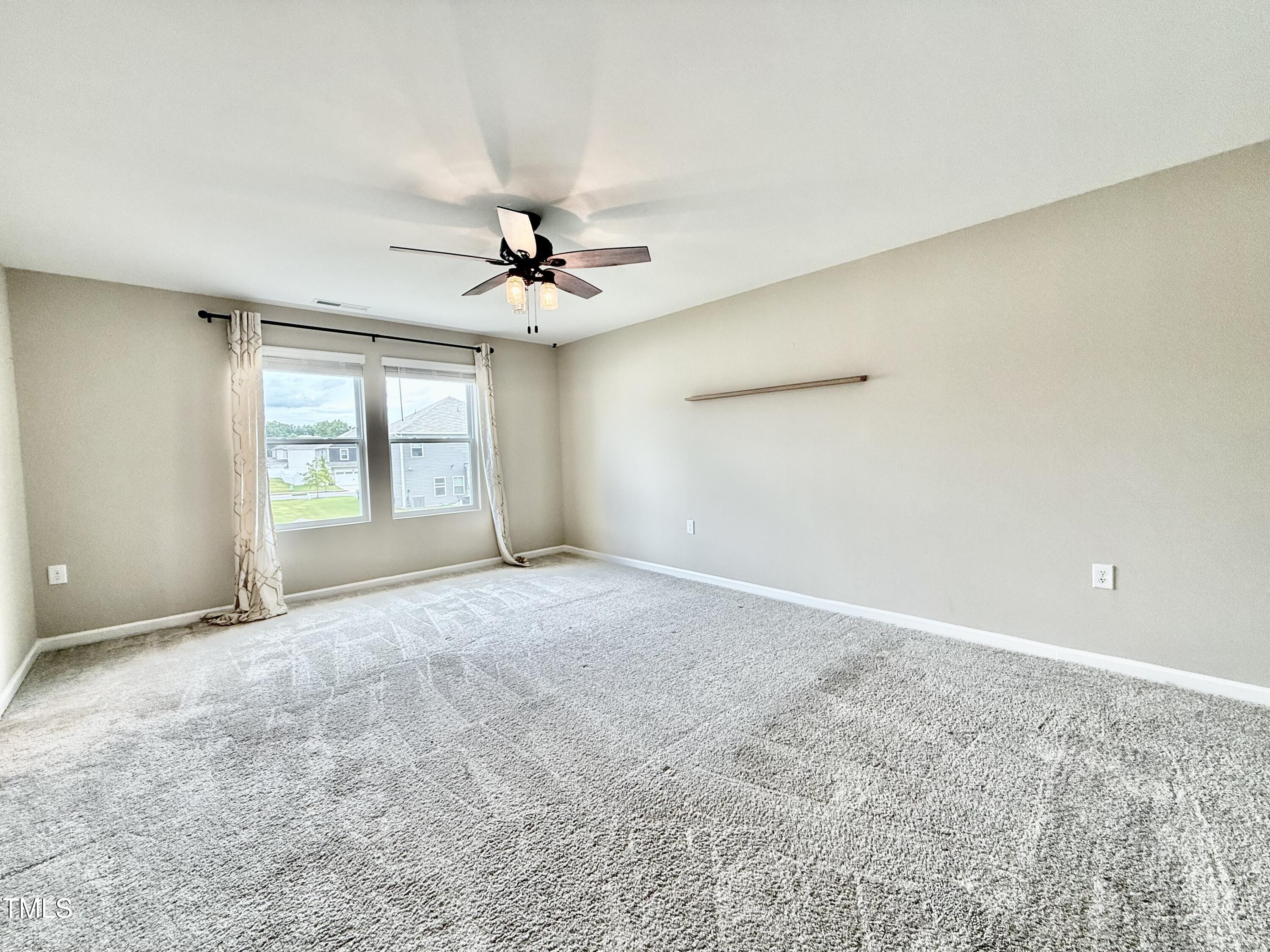 3904 Leeson Trail Raleigh, NC 27616 - Photo 25 of 43 a view of an empty room with a window