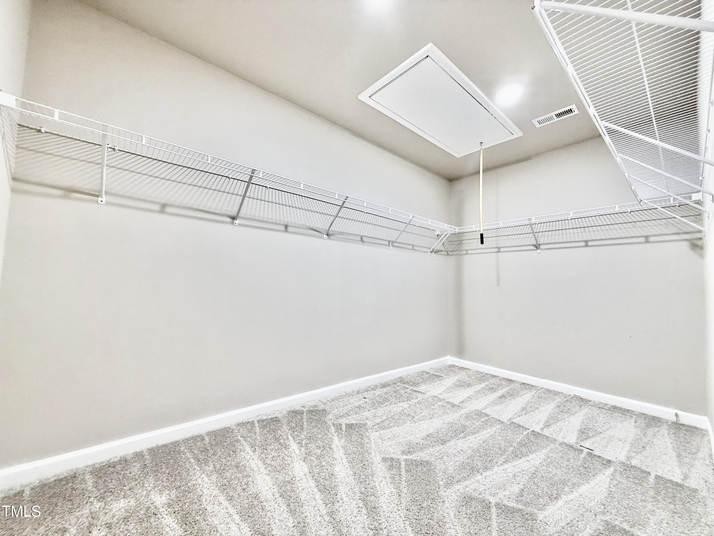 3904 Leeson Trail Raleigh, NC 27616 - Photo 27 of 43 a view of a room with racks on the wall