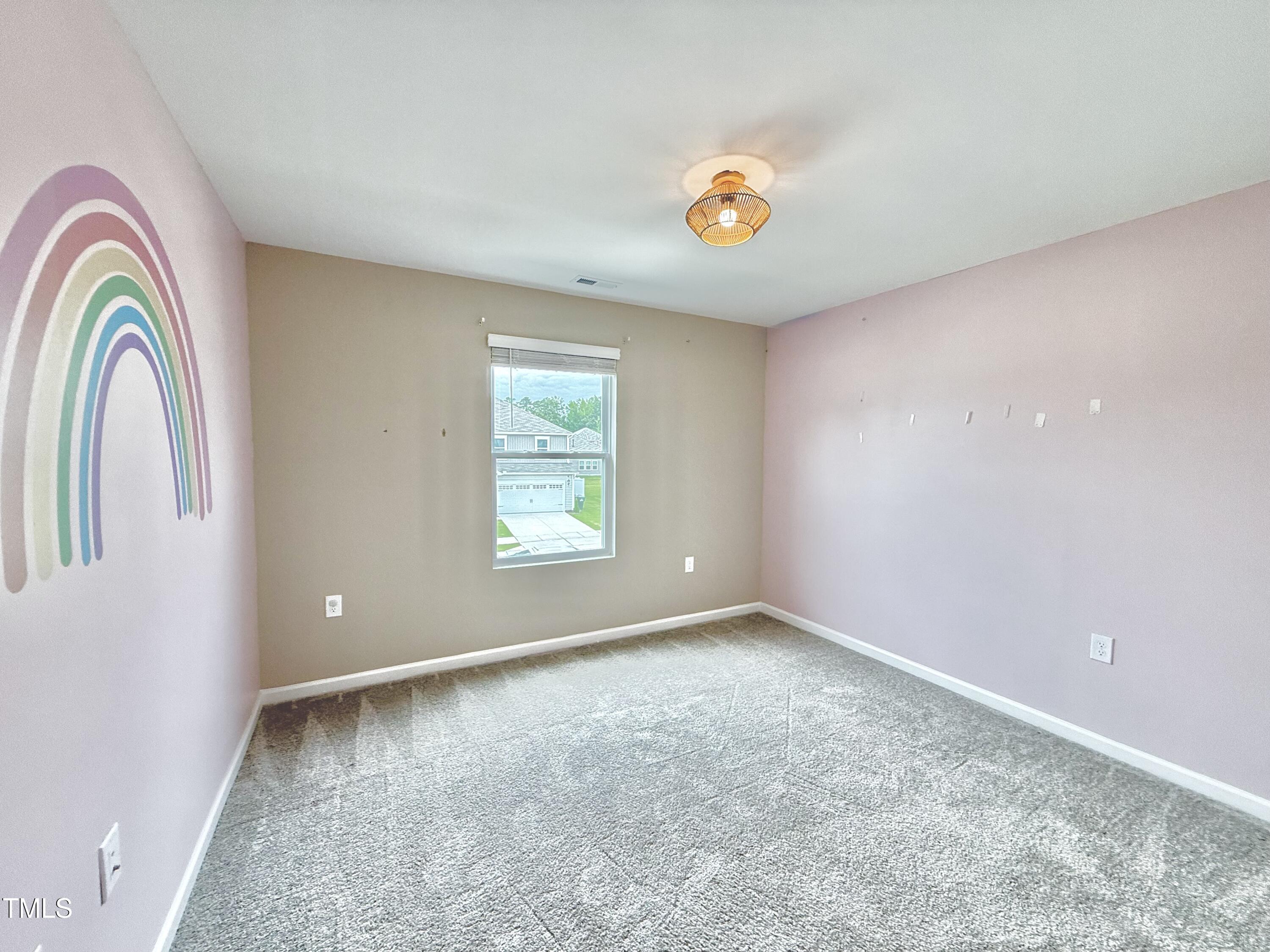 3904 Leeson Trail Raleigh, NC 27616 - Photo 34 of 43 an empty room with windows