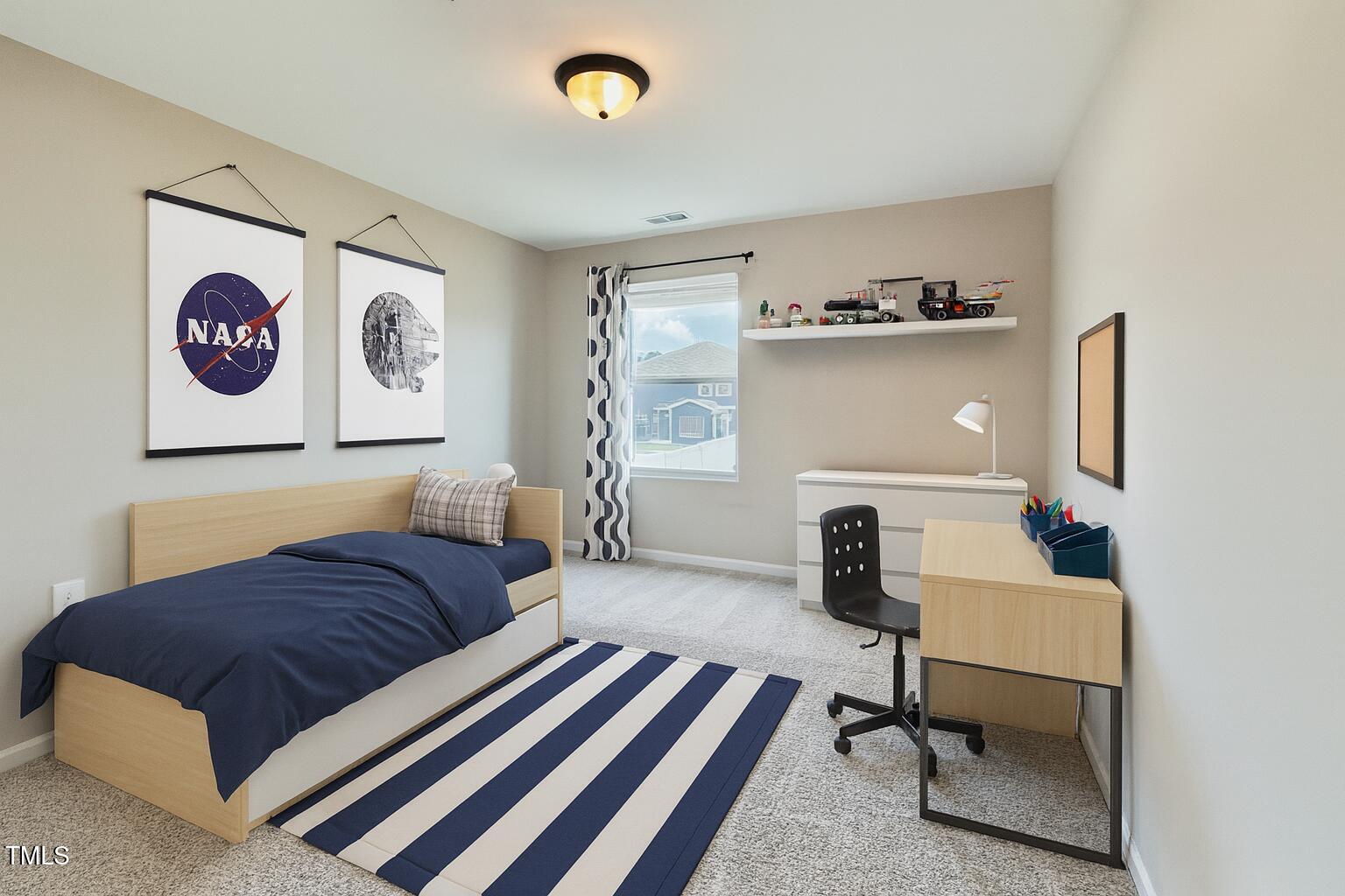 3904 Leeson Trail Raleigh, NC 27616 - Photo 35 of 43 a bedroom with a bed and a couch