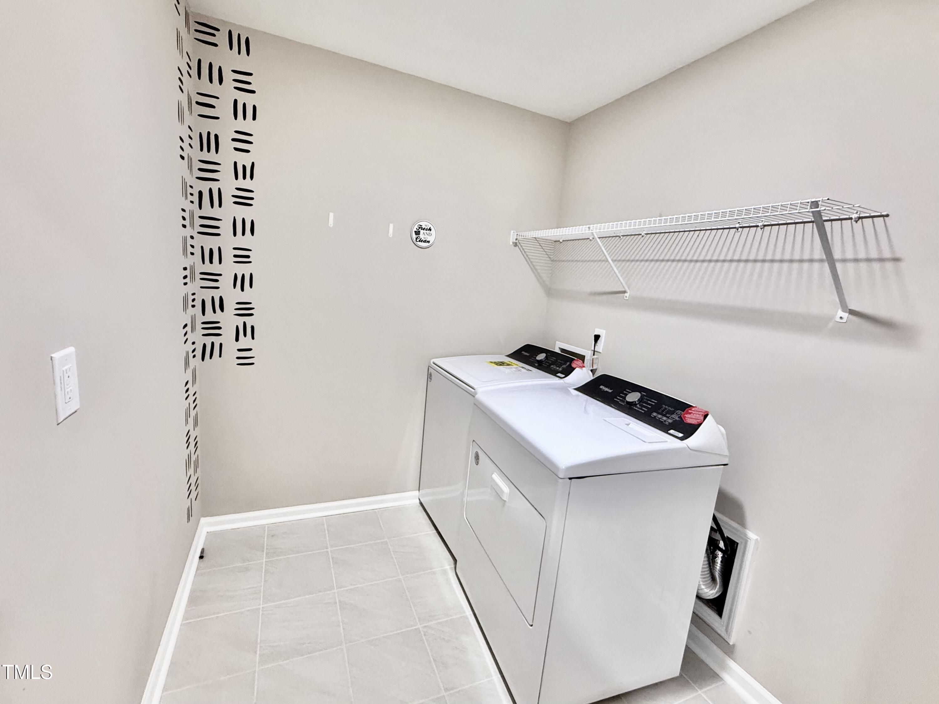 3904 Leeson Trail Raleigh, NC 27616 - Photo 40 of 43 a utility room with dryer and washer