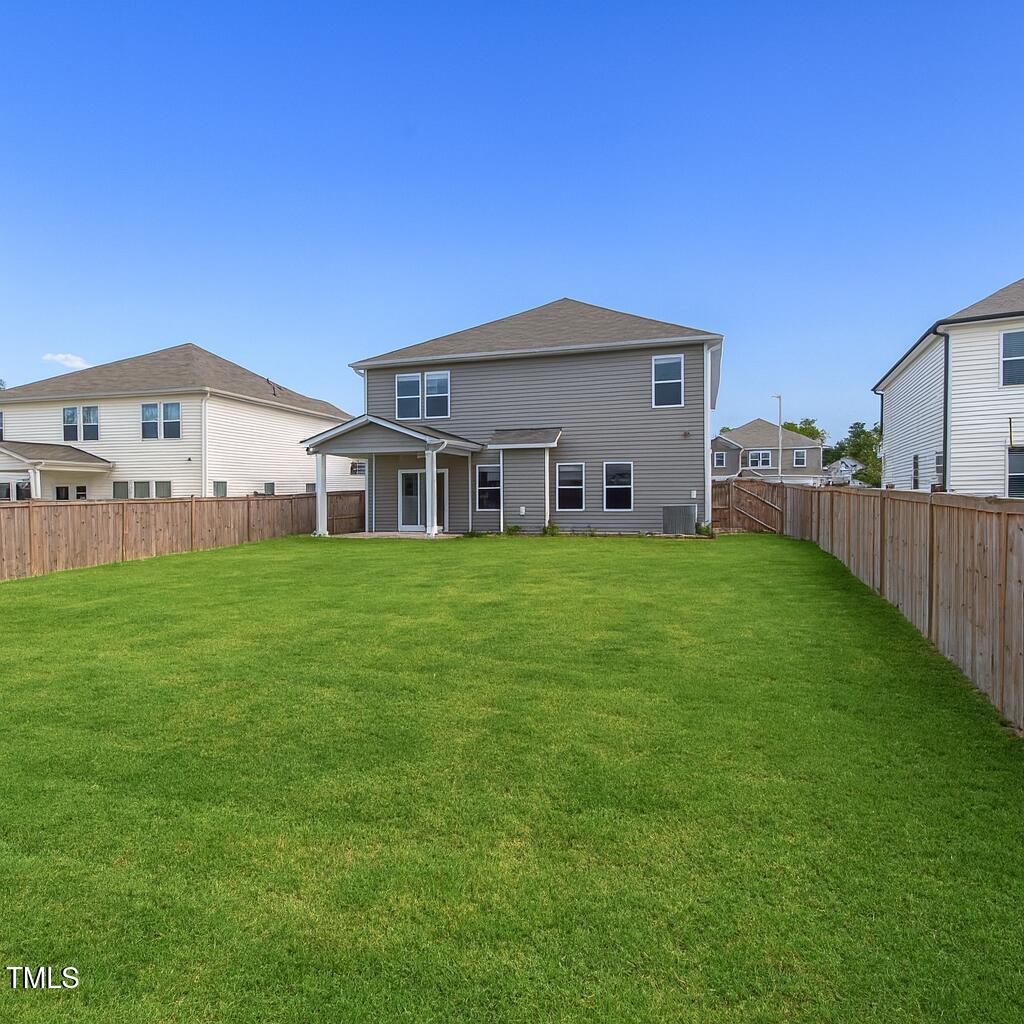 3904 Leeson Trail Raleigh, NC 27616 - Photo 43 of 43 a view of a house with a yard and sitting area