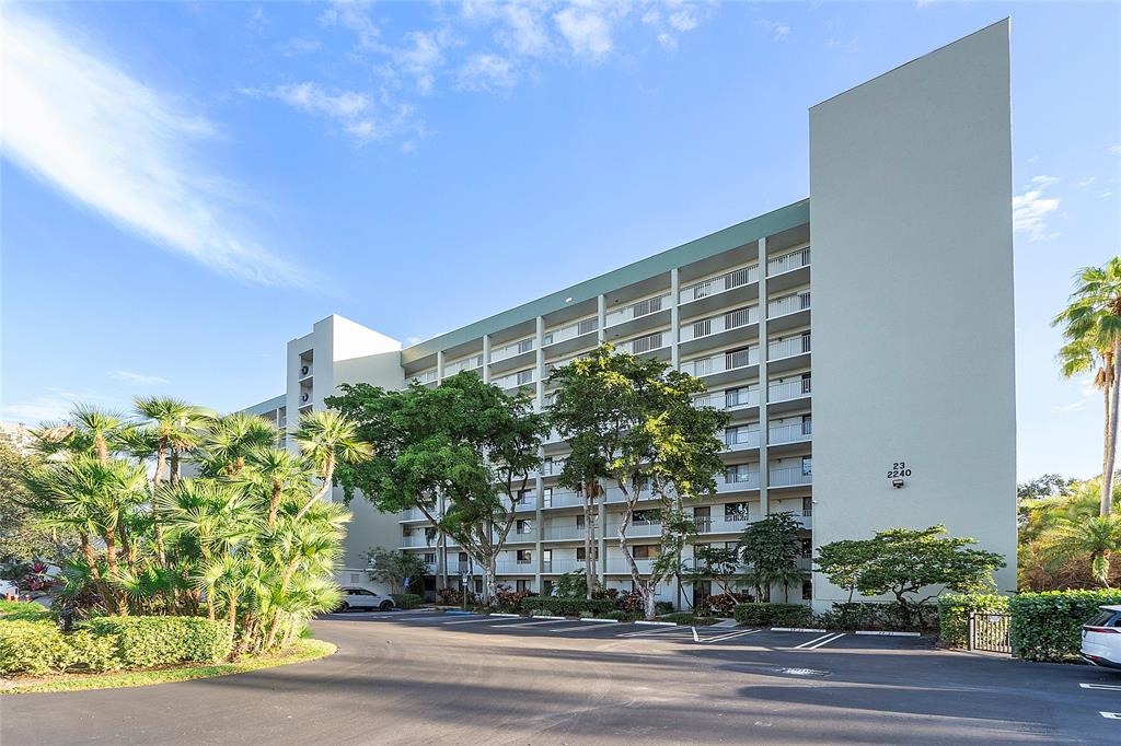 2240 North Cypress Bend Drive, Unit 908 Pompano Beach, FL 33069 - Photo 33 of 66 a front view of a building