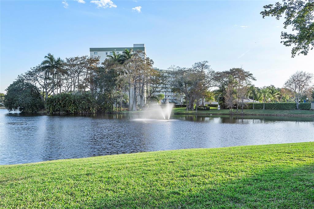 2240 North Cypress Bend Drive, Unit 908 Pompano Beach, FL 33069 - Photo 35 of 66 a view of a lake