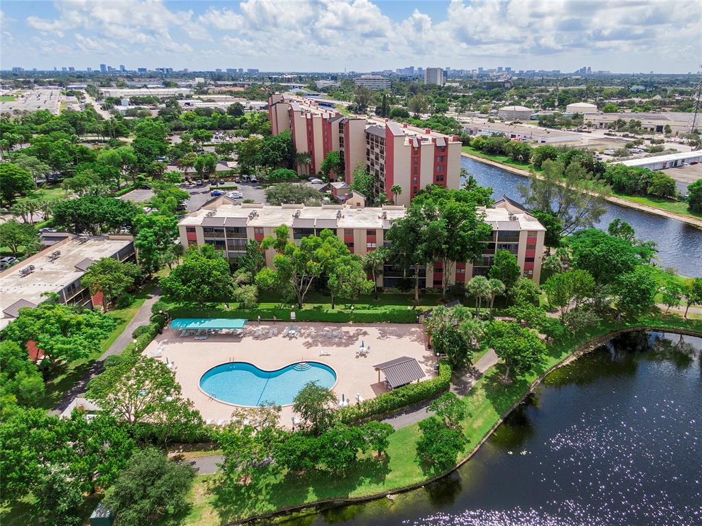 2240 North Cypress Bend Drive, Unit 908 Pompano Beach, FL 33069 - Photo 57 of 66 an aerial view of multiple house