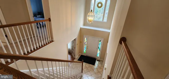 a view of a balcony with wooden floor