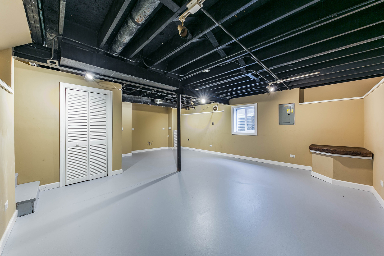 448 Bluebird Drive Bolingbrook, IL 60440 - Photo 16 of 20 a view of an empty room with wooden floor and windows