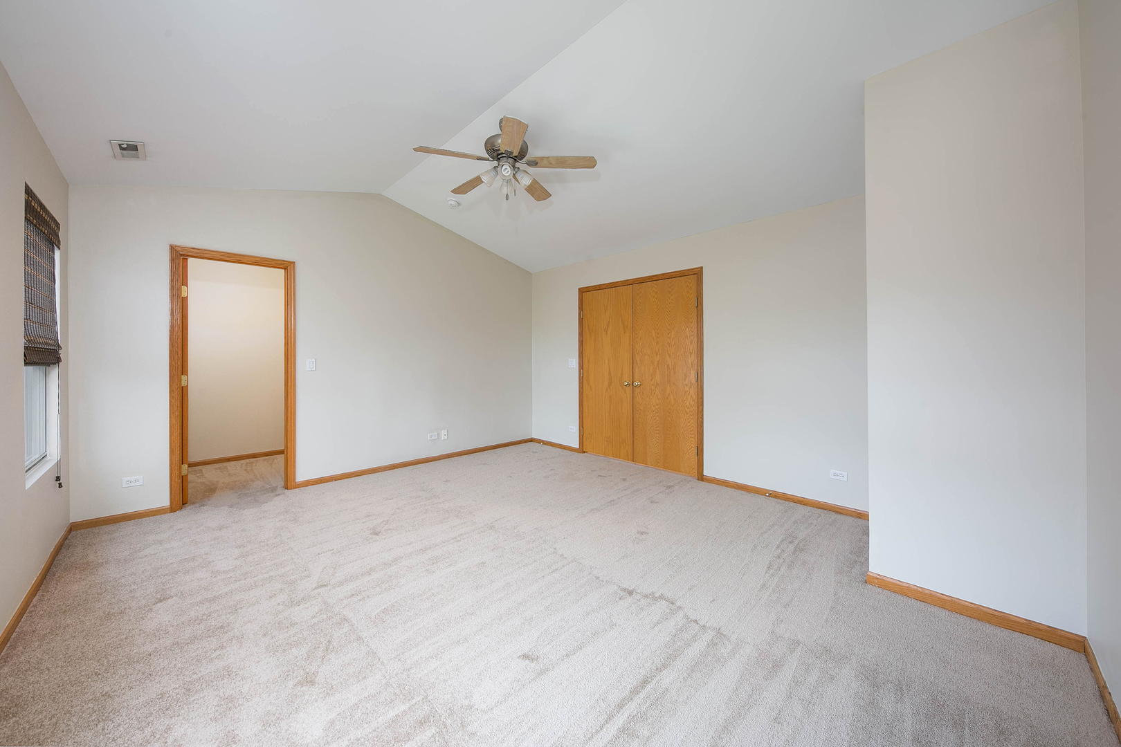 448 Bluebird Drive Bolingbrook, IL 60440 - Photo 10 of 20 a view of empty room with ceiling fan