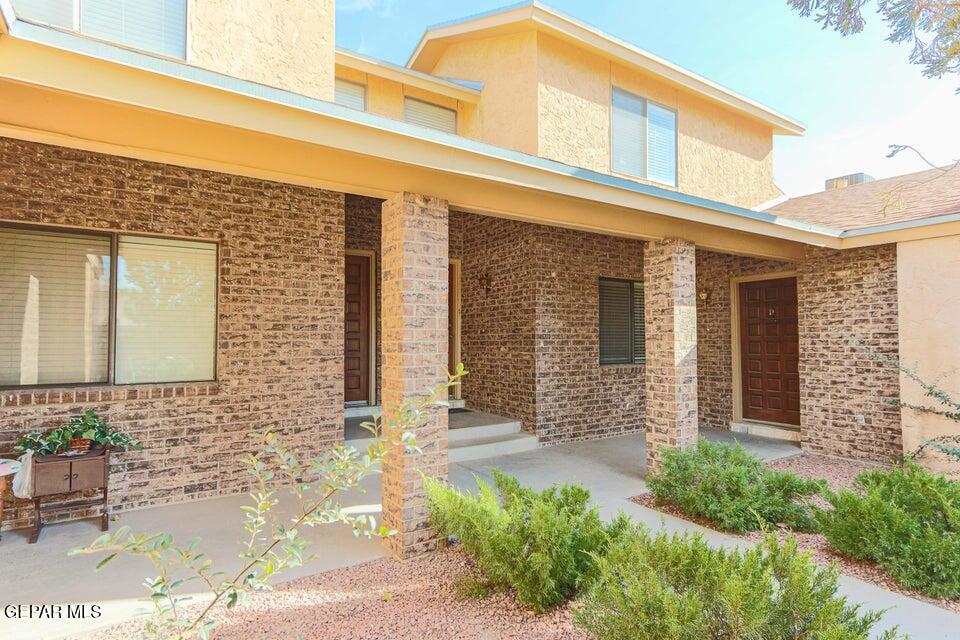 2008 Amy Sue Drive, Unit C El Paso, TX 79936 - Photo 1 of 21 a front view of a house with large windows
