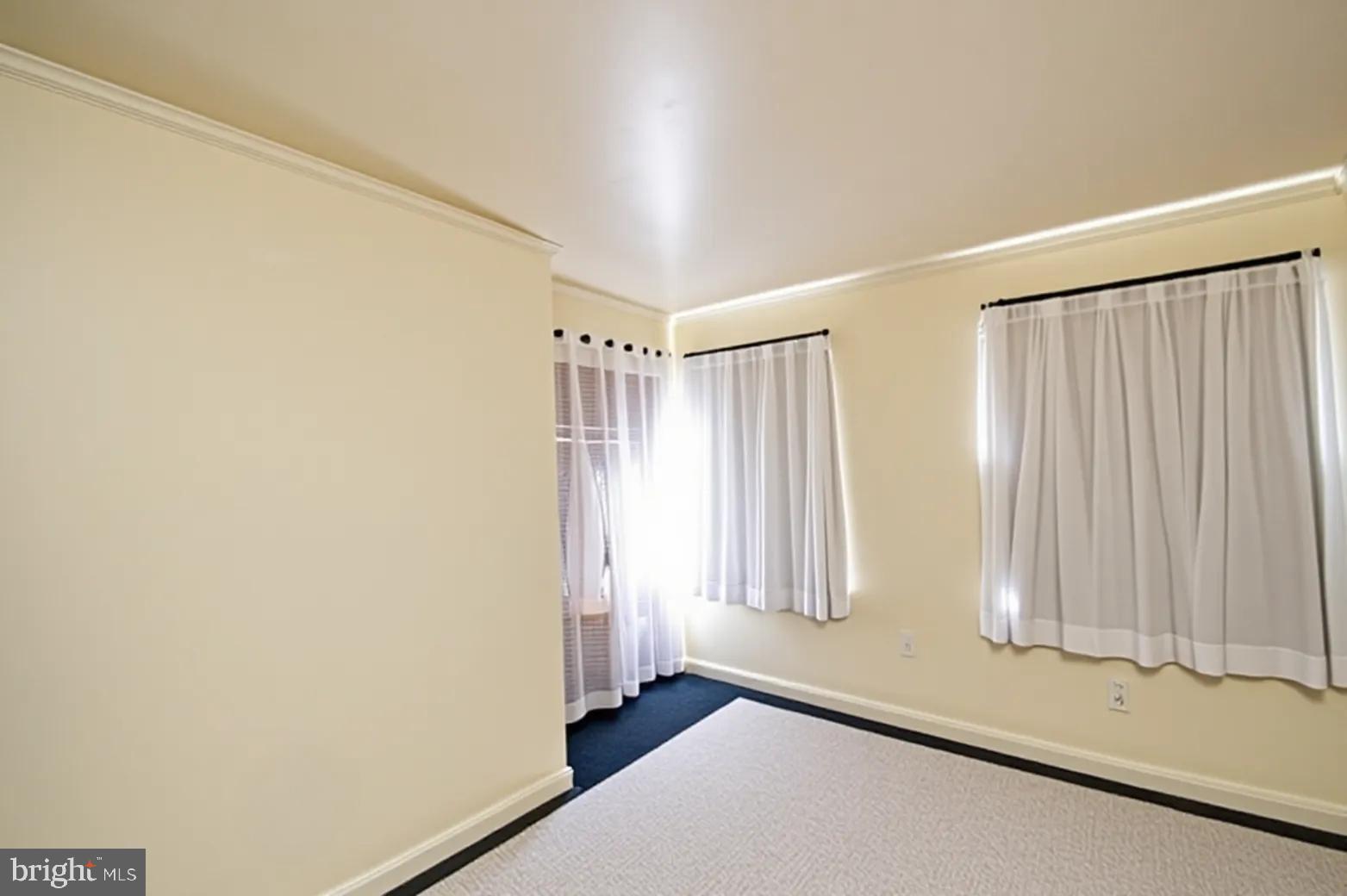 807 Bayly Road Cambridge, MD 21613 - Photo 15 of 35 Upstairs bedroom, furnishings virtually removed