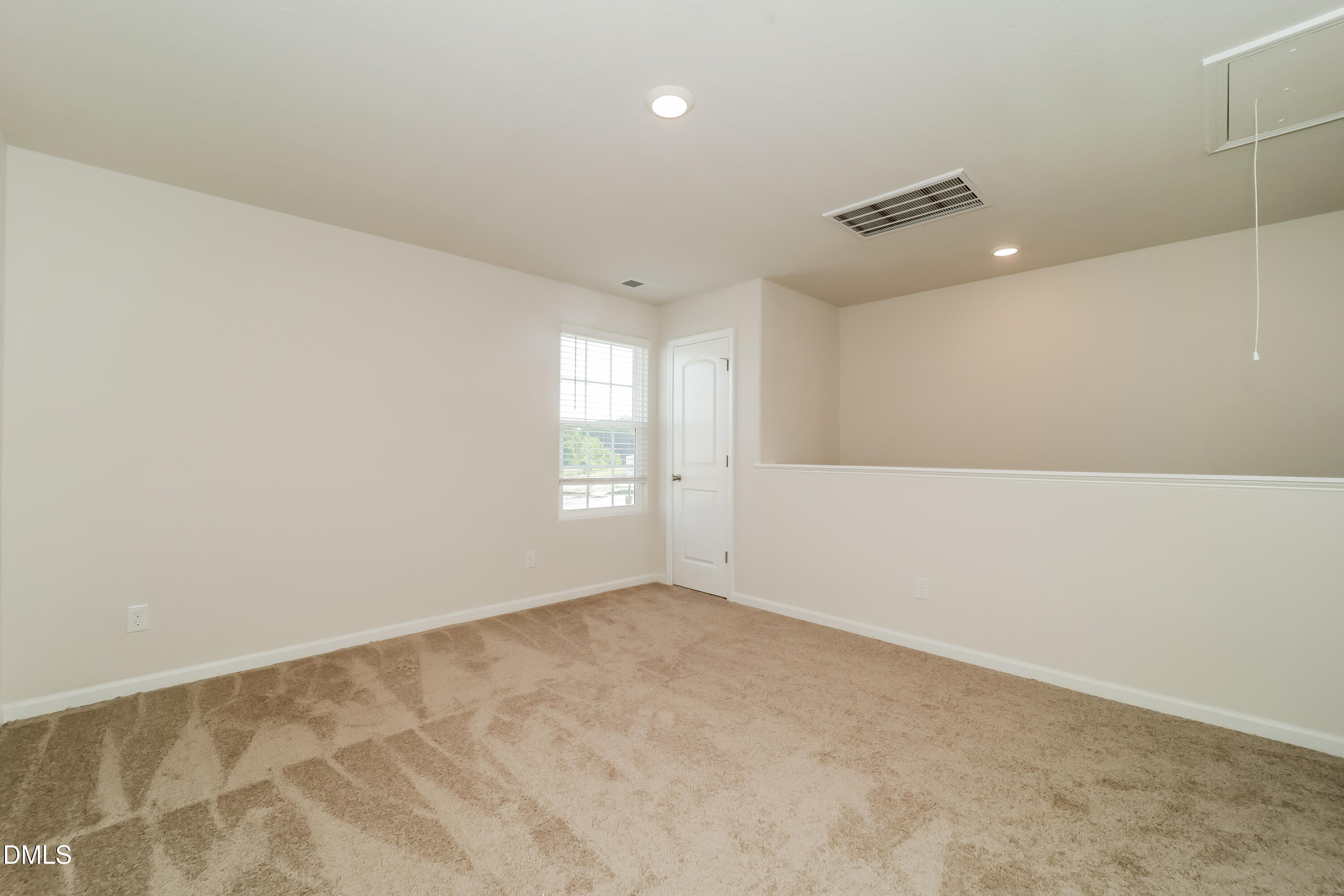 328 Gourd Street Zebulon, NC 27597 - Photo 6 of 17 wooden floor in an empty room with a window