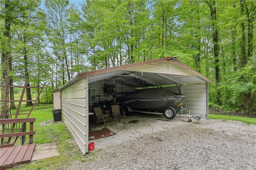 2490 Dodgeville Road Rome, OH 44085 - Photo 31 of 42 View of car parking featuring a carport