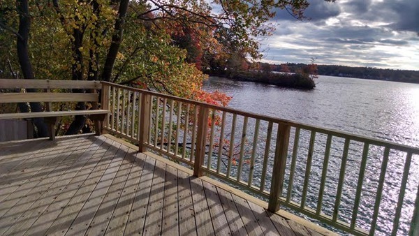 105 Kimball Road Amesbury, MA 01913 - Photo 2 of 20 a balcony with wooden floor