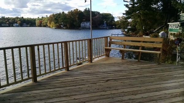 105 Kimball Road Amesbury, MA 01913 - Photo 3 of 20 a view of balcony with wooden floor and fence