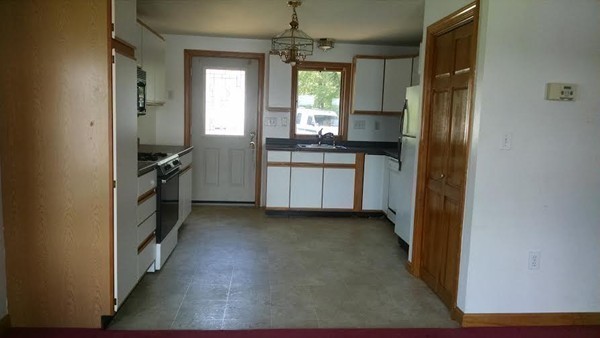 105 Kimball Road Amesbury, MA 01913 - Photo 6 of 20 a kitchen with a refrigerator and a sink