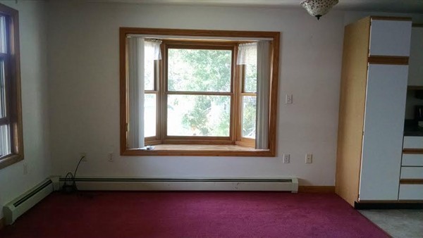 105 Kimball Road Amesbury, MA 01913 - Photo 8 of 20 an empty room with a window