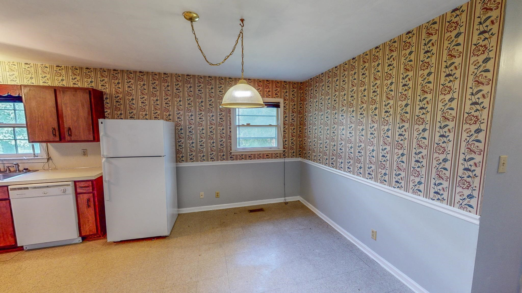 5516 Old NC 10 Durham, NC 27705 - Photo 15 of 26 a storage room with washer and dryer
