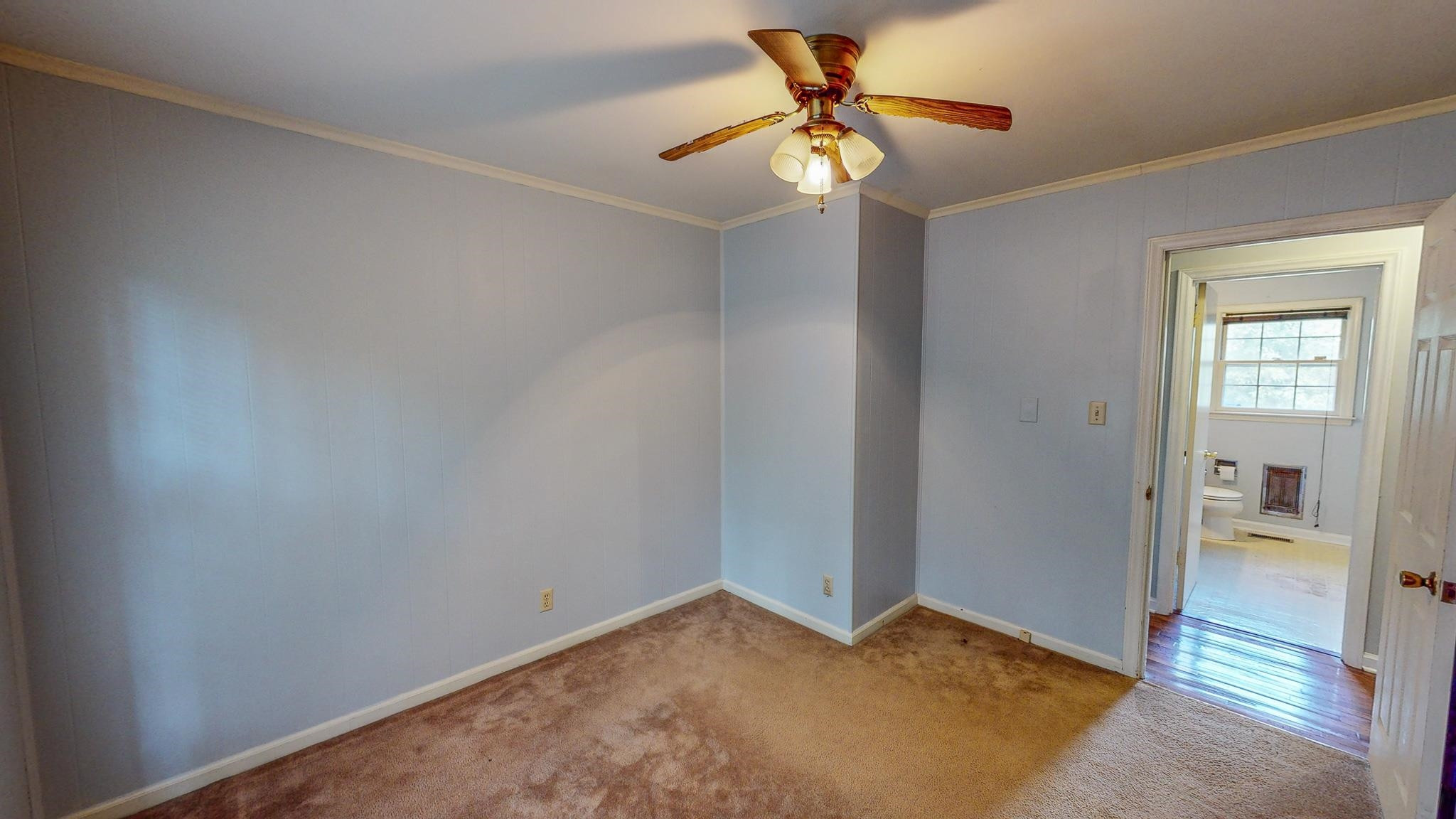 5516 Old NC 10 Durham, NC 27705 - Photo 17 of 26 an empty room with fan and entrance