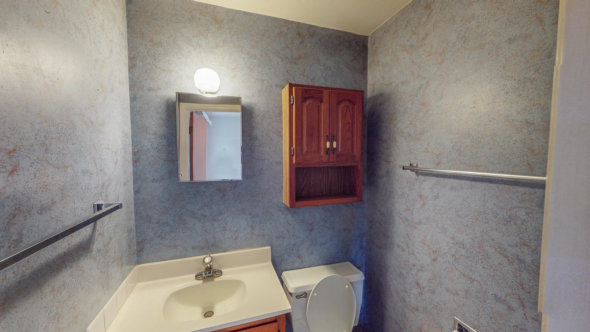 5516 Old NC 10 Durham, NC 27705 - Photo 23 of 26 a bathroom with a sink and a toilet