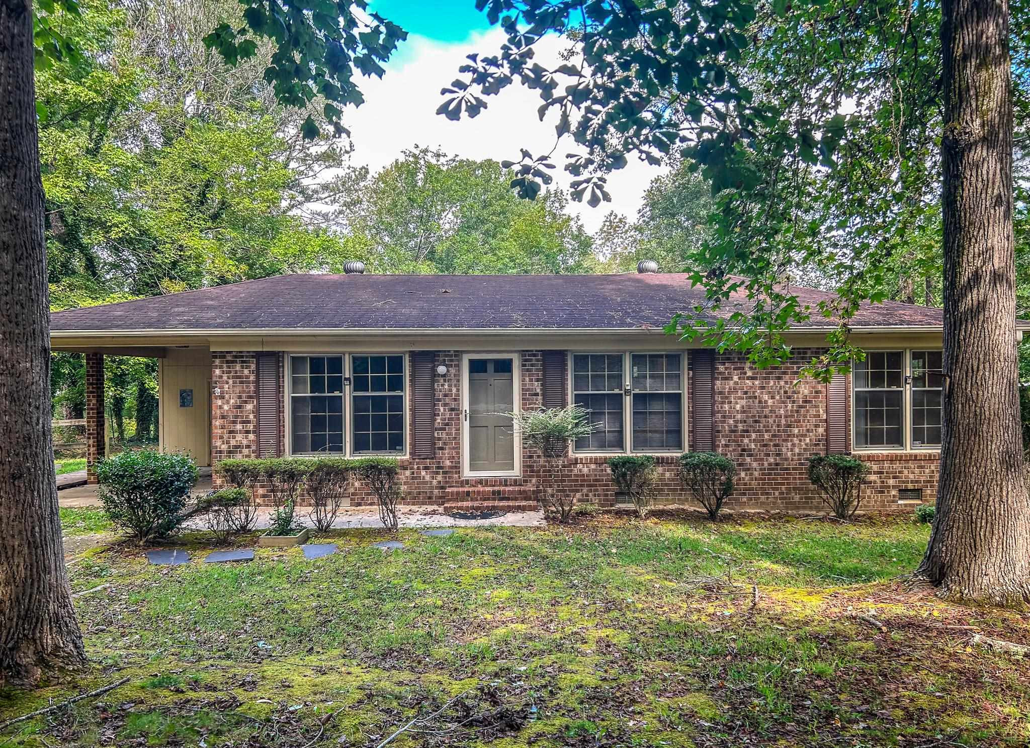 5516 Old NC 10 Durham, NC 27705 - Photo 7 of 26 a front view of house with yard and outdoor seating