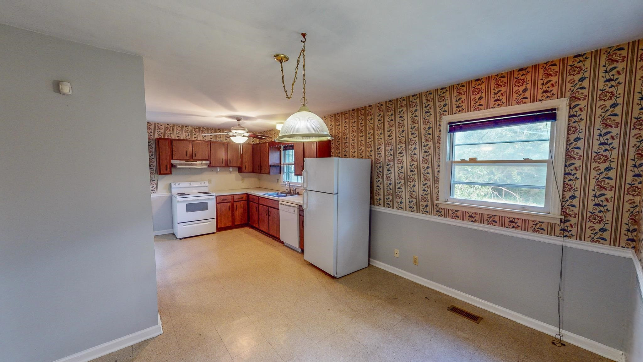 5516 Old NC 10 Durham, NC 27705 - Photo 10 of 26 a view of a kitchen with a stove cabinets
