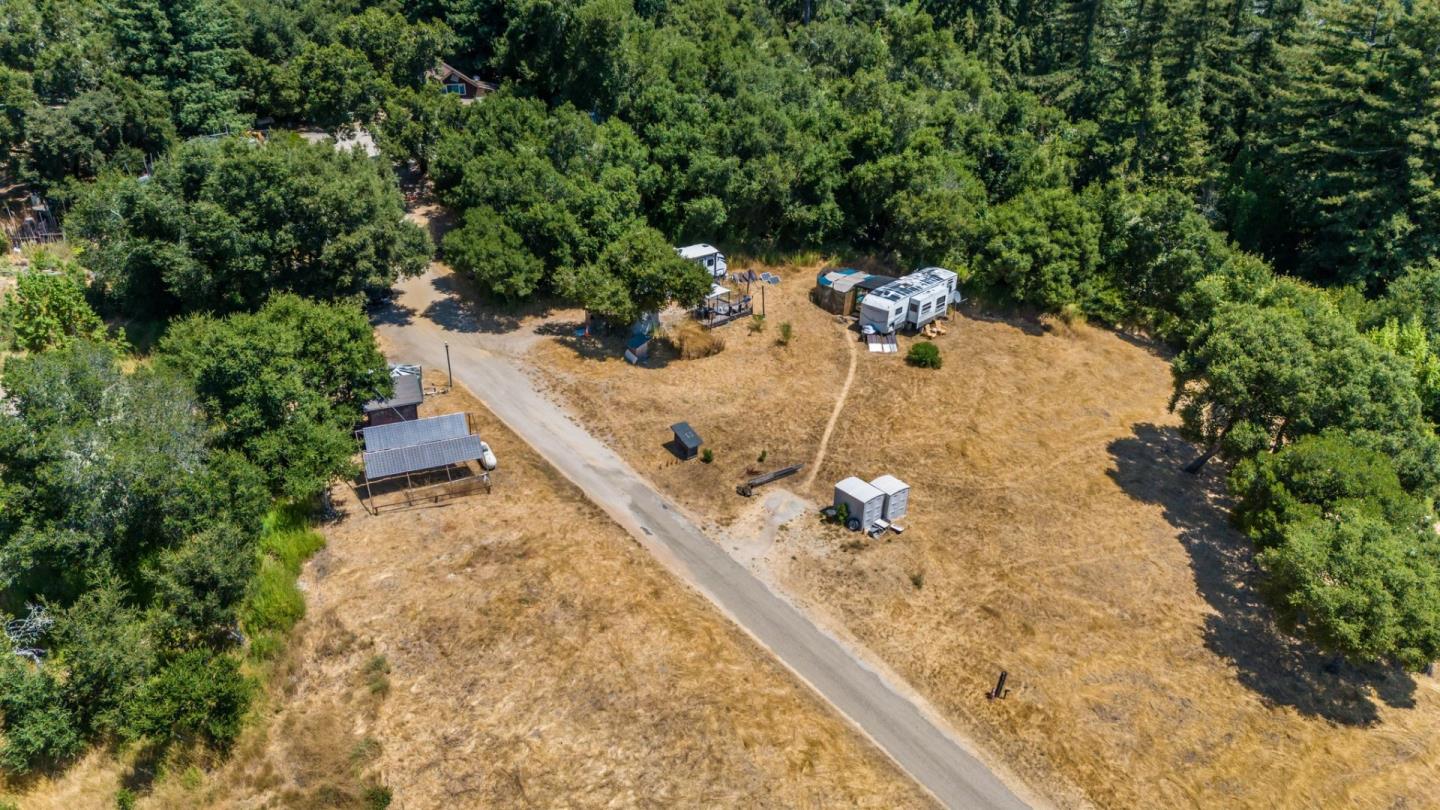 9000 Lompico Road Felton, CA 95018 - Photo 25 of 28 an aerial view of a house with a yard and lake view