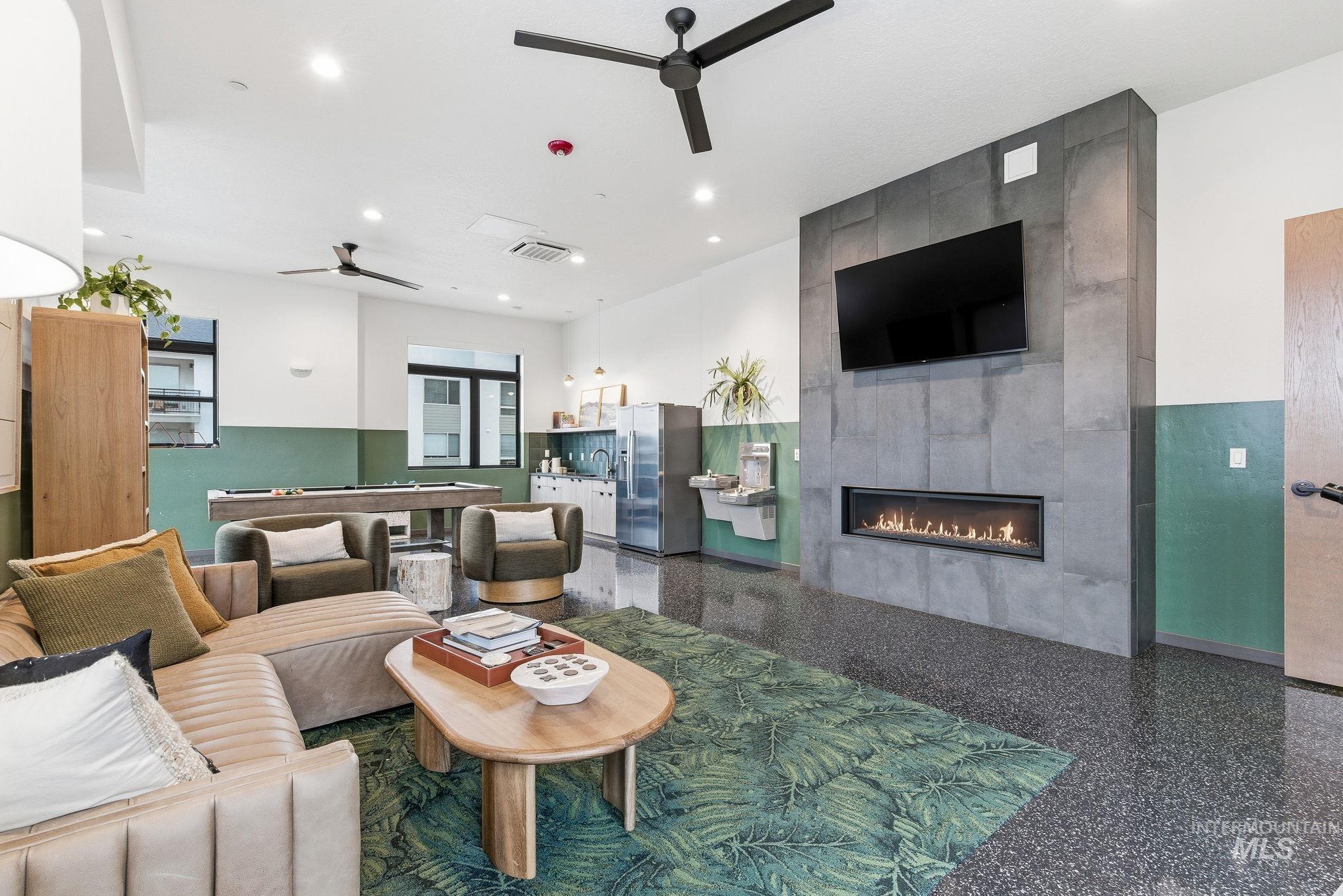 3928 East Haystack Street, Unit 107 Boise, ID 83716 - Photo 23 of 37 Living room with a ceiling fan, a tile fireplace, speckled floor, recessed lighting, and billiards table