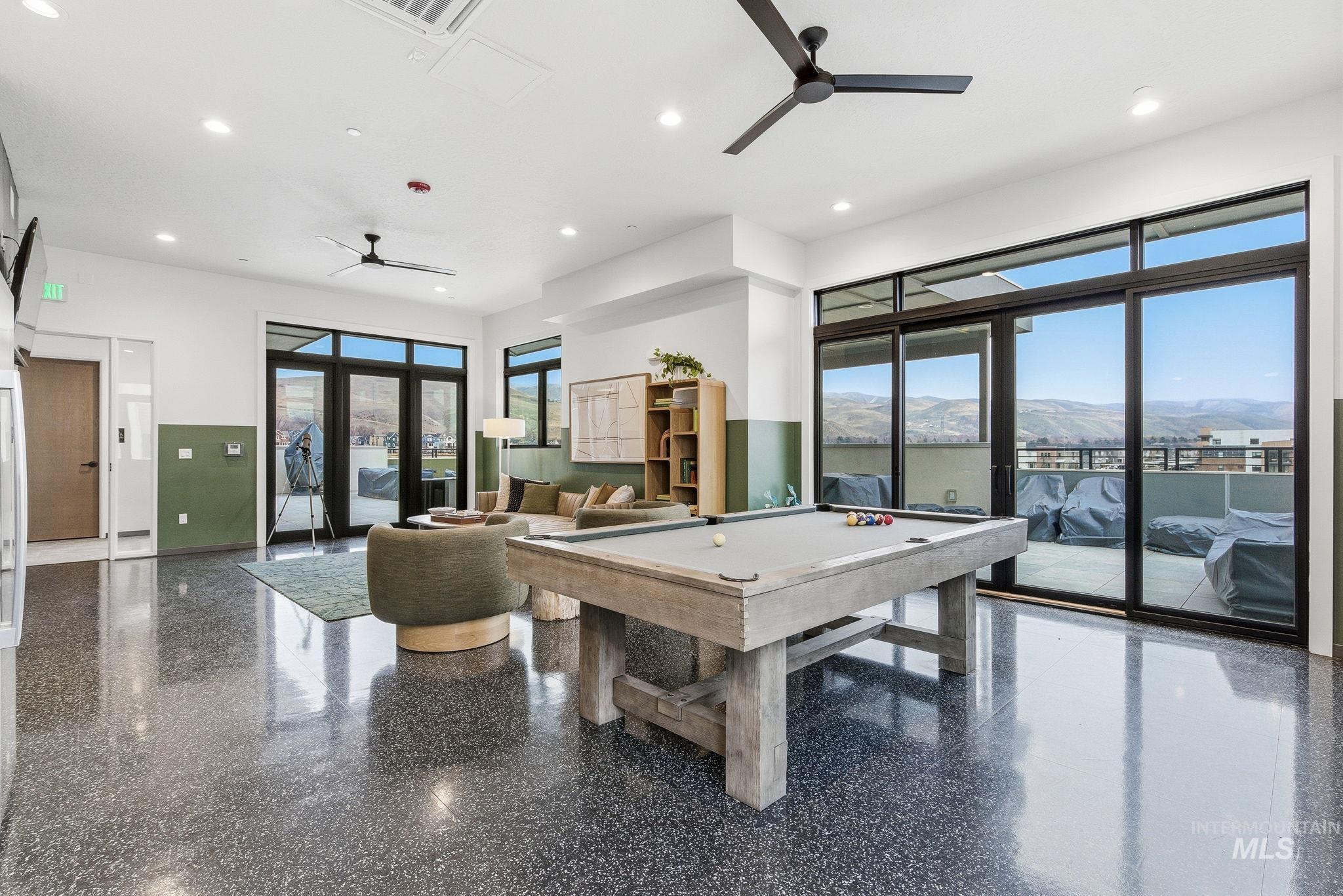 3928 East Haystack Street, Unit 107 Boise, ID 83716 - Photo 26 of 37 Rec room with a mountain view, billiards table, a ceiling fan, and recessed lighting
