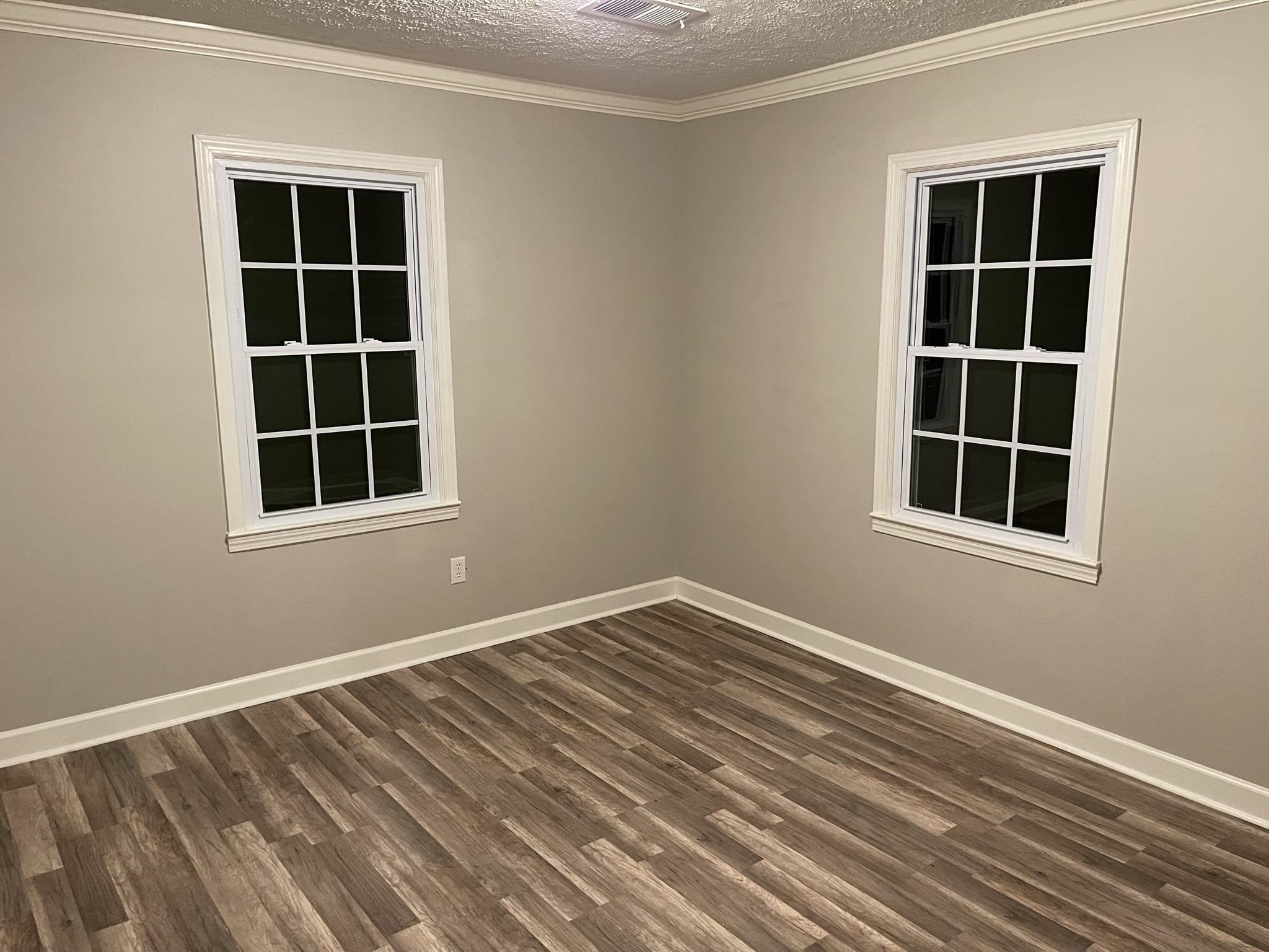 114 Old Denmark Road Jackson, TN 38301 - Photo 8 of 12 a view of empty room with windows