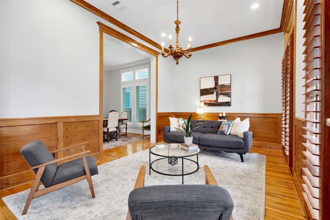 612 Rutland Street Houston, TX 77007 - Photo 11 of 45 Designed for the Modern Host. The open-concept parlor flows seamlessly into the formal dining and kitchen, offering a grand setting for holiday gatherings and intimate evenings alike. A true showcase of Southern charm and modern scale.