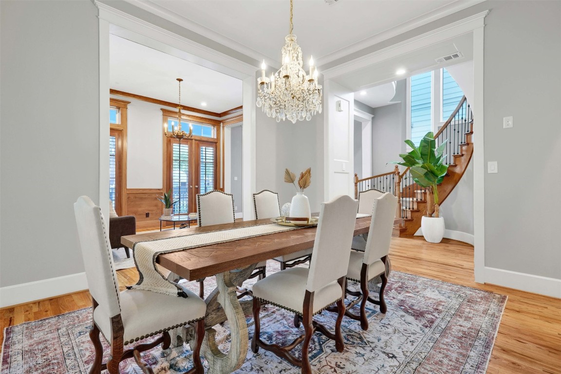 612 Rutland Street Houston, TX 77007 - Photo 13 of 45 Grand Proportions. Experience the luxury of a dedicated dining room that doesn't feel confined. Defined by architectural volume and pristine hardwood floors, this space is as beautiful as it is functional for modern living.