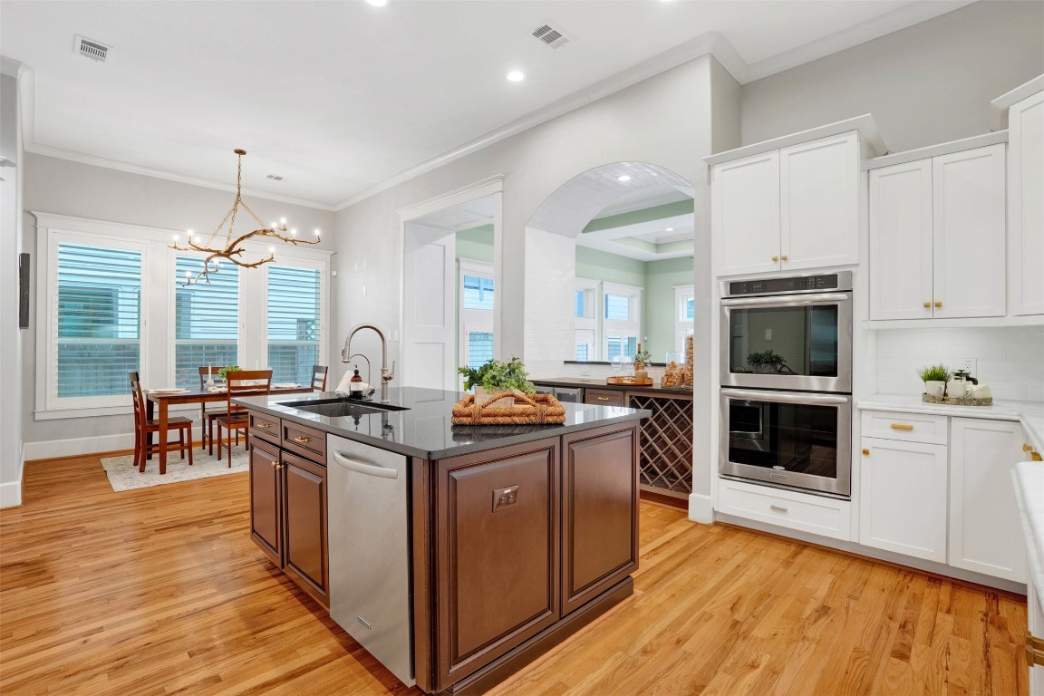 612 Rutland Street Houston, TX 77007 - Photo 16 of 45 Maximum Utility. Enjoy the convenience of a deep-basin sink that handles large cookware with ease, keeping your primary counters clear for prep.