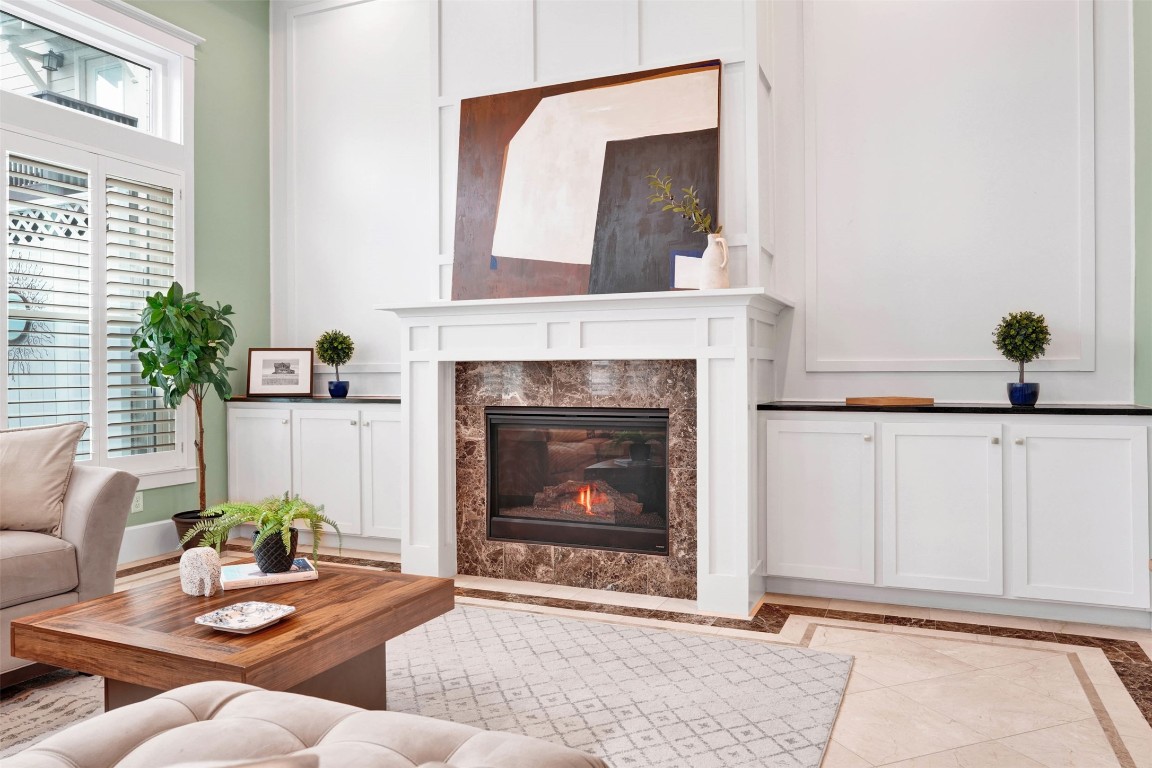 612 Rutland Street Houston, TX 77007 - Photo 22 of 45 Serviced & Sparkling.
The heart of the family room features a freshly serviced fireplace (2026), perfectly positioned among soaring tray ceilings and custom built-ins for ultimate relaxation.