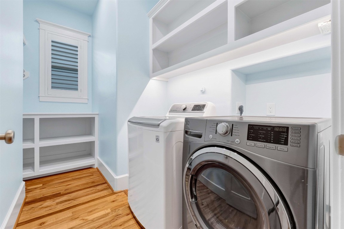 612 Rutland Street Houston, TX 77007 - Photo 33 of 45 A Laundry Room Designed for Real Life.
This isn't just a utility space—it’s a command center. The 2025 redesign features dedicated cubbies for laundry baskets and a generous, seamless countertop for effortless folding and sorting.