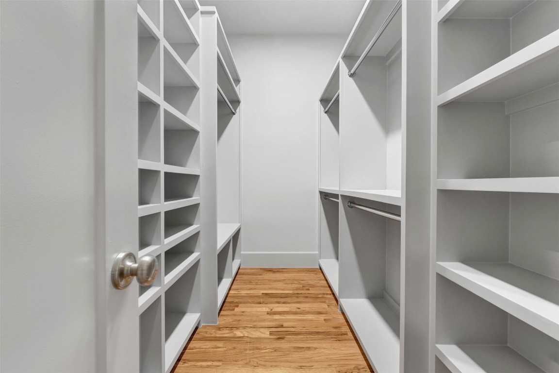 612 Rutland Street Houston, TX 77007 - Photo 41 of 45 Storage at Scale. Capitalizing on the home’s high ceilings, these closets offer vertical storage that goes well beyond the standard. With custom millwork and a bright, airy aesthetic, these dual suites provide a sophisticated home for every season of your wardrobe.