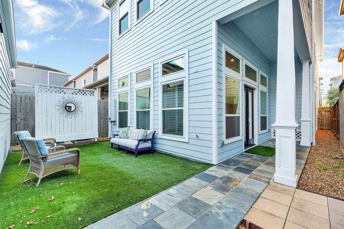 612 Rutland Street Houston, TX 77007 - Photo 43 of 45 Privacy & Yard Space. Fully fenced and private, this backyard sanctuary offers the perfect blend of relaxation and function.