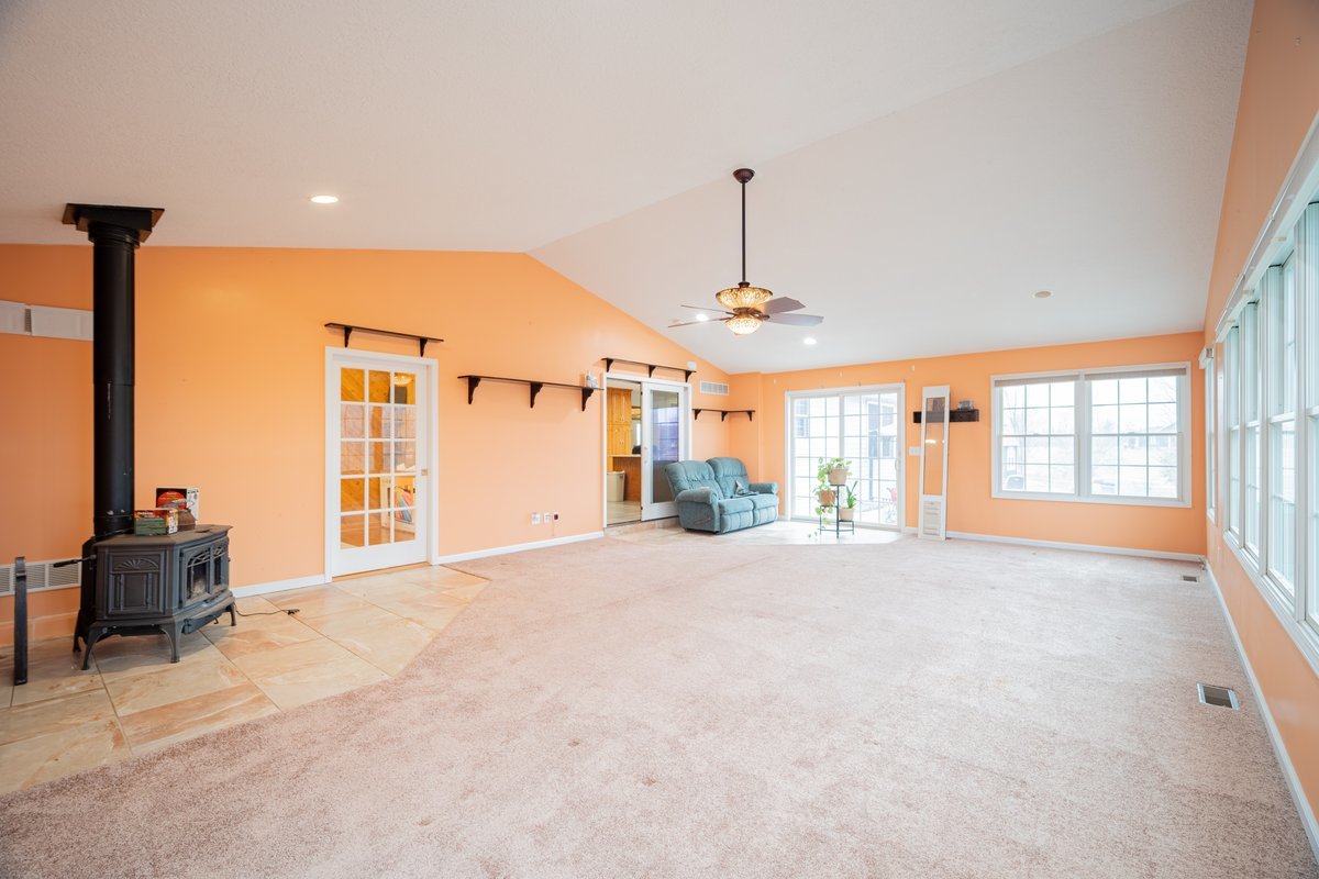 8401 Idlewood Road Clinton, IL 61727 - Photo 14 of 42 a view of an empty room with a window