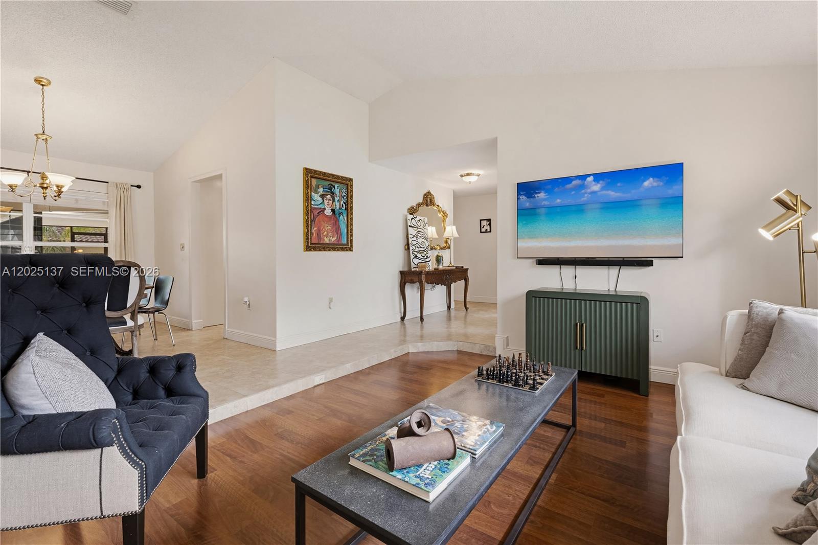 11480 Southwest 96th Terrace Miami, FL 33176 - Photo 6 of 54 a living room with furniture a rug and a flat screen tv
