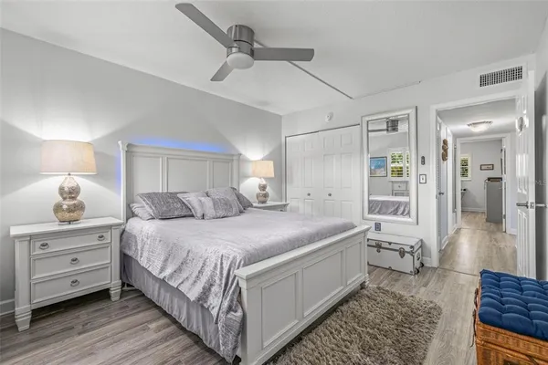 a bed room with a bed and window