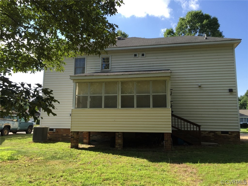7317 Trailing Rock Road Prince George, VA 23875 - Photo 16 of 17 a front view of a house with a yard