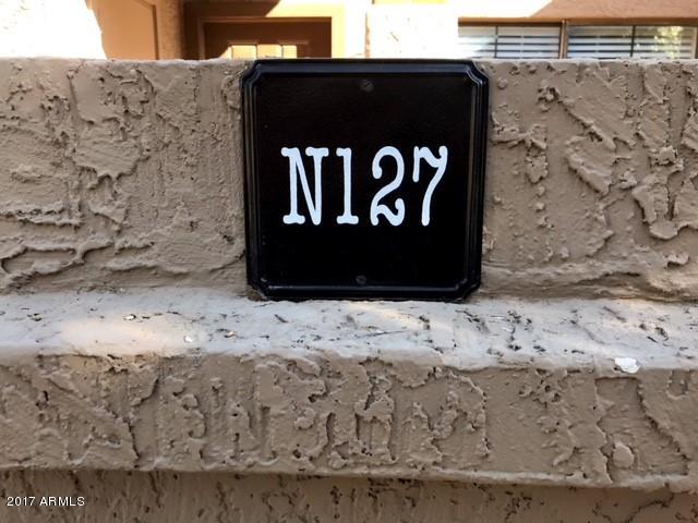 700 East Mesquite Circle, Unit N127 Tempe, AZ 85288 - Photo 15 of 16 a view of a wooden door