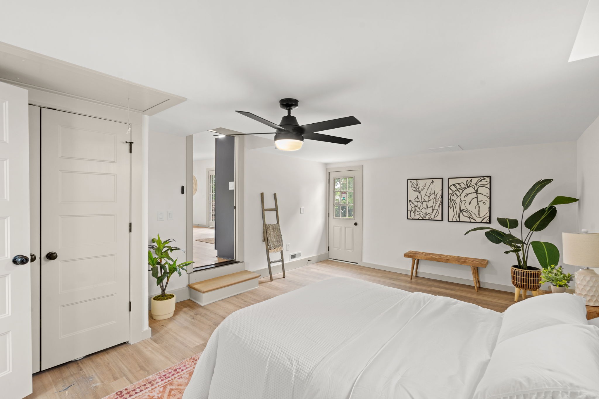 3004 Anderson Road Nashville, TN 37217 - Photo 14 of 28 a bedroom with a bed and a chandelier