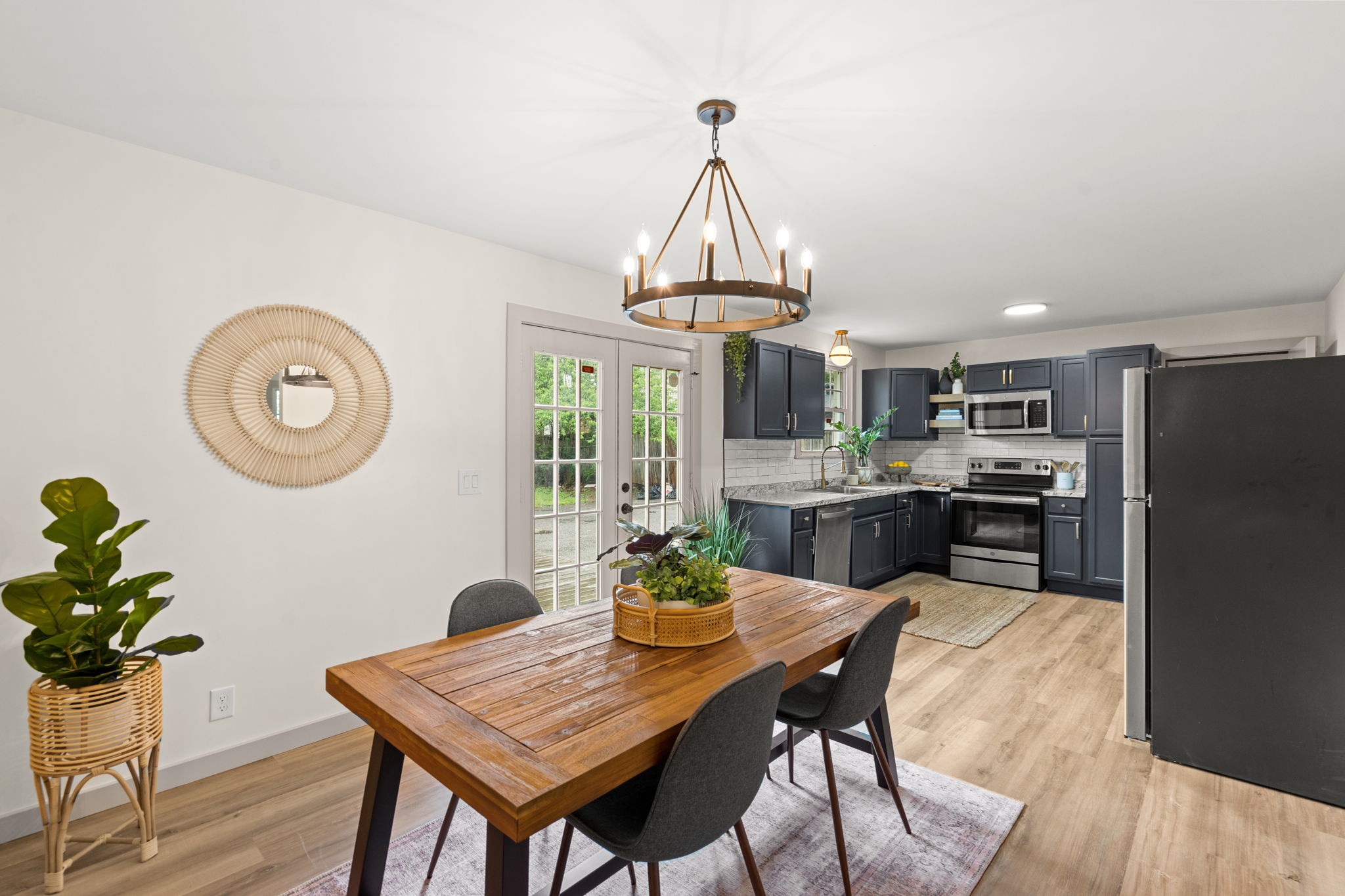3004 Anderson Road Nashville, TN 37217 - Photo 7 of 28 a view of a dining room with furniture window and wooden floor