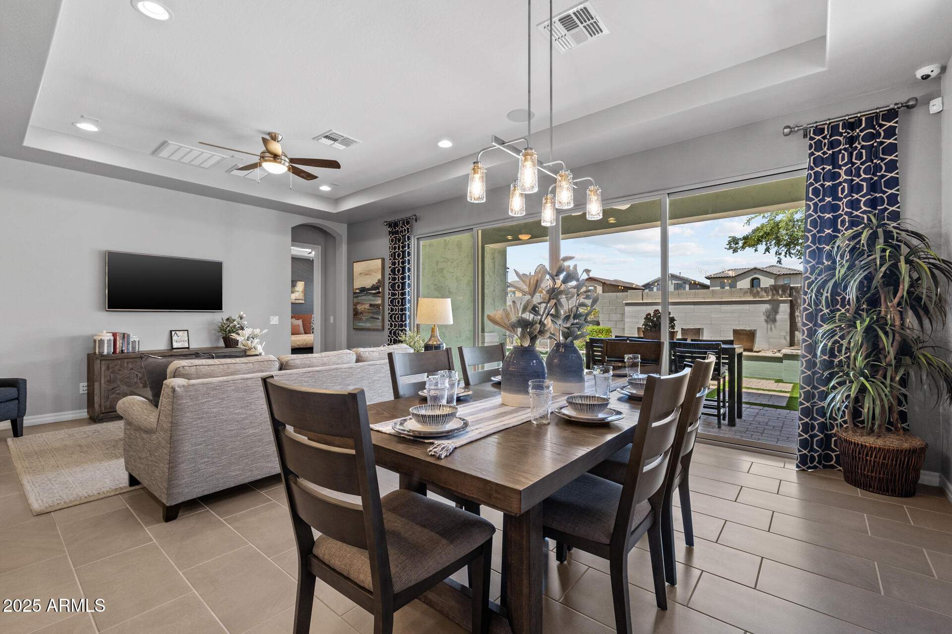 4273 East John Street Gilbert, AZ 85295 - Photo 11 of 29 a view of a dining room with furniture window and wooden floor