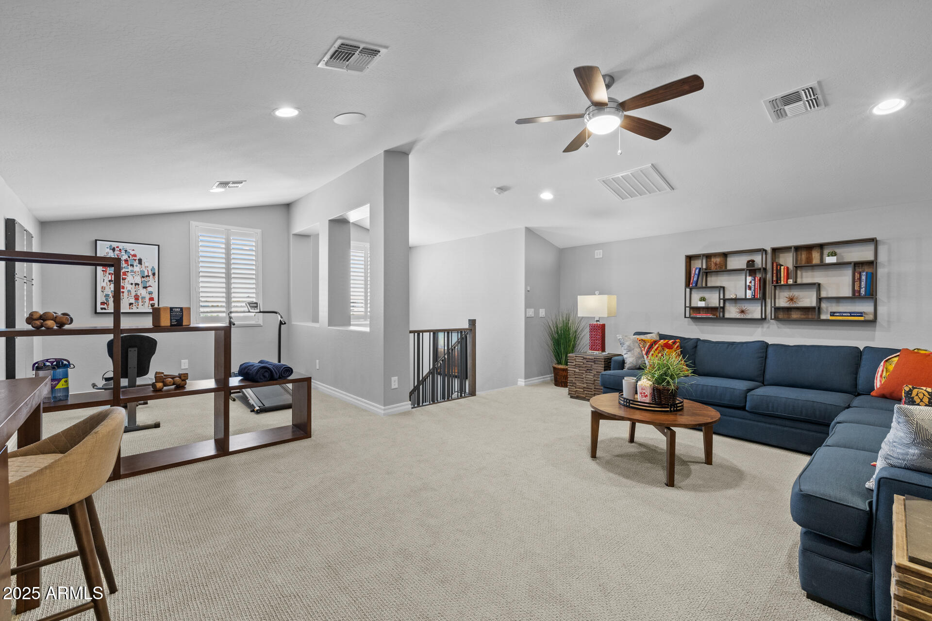 4273 East John Street Gilbert, AZ 85295 - Photo 13 of 29 a living room with furniture and a ceiling fan