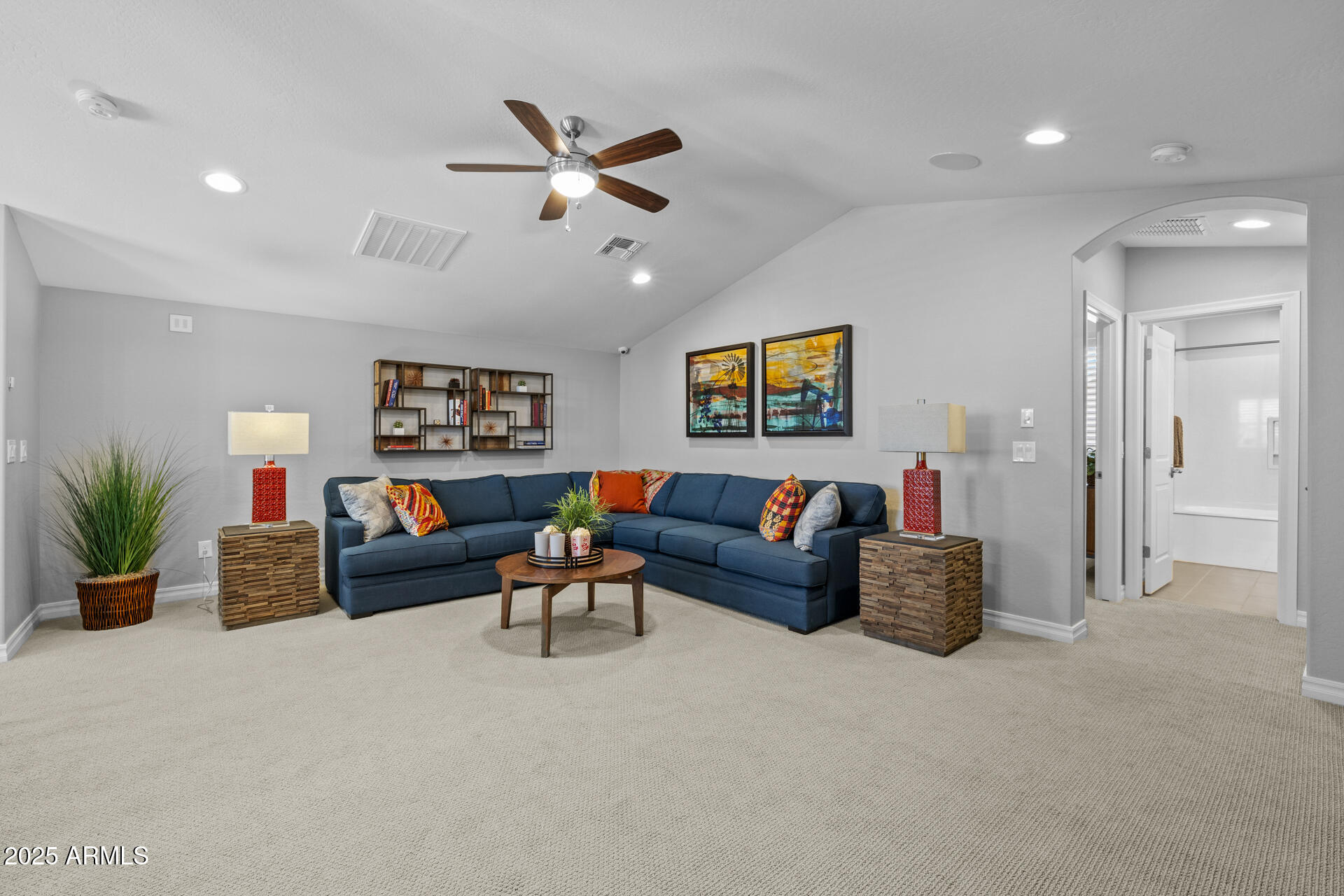 4273 East John Street Gilbert, AZ 85295 - Photo 14 of 29 a living room with furniture and a flat screen tv