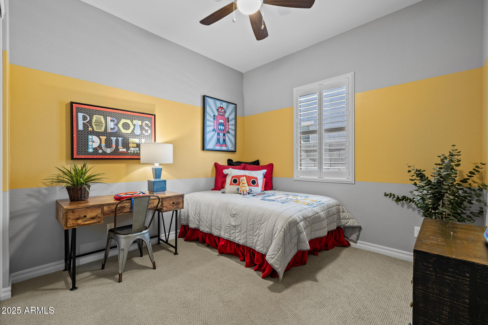 4273 East John Street Gilbert, AZ 85295 - Photo 20 of 29 a bedroom with a bed and a table in it